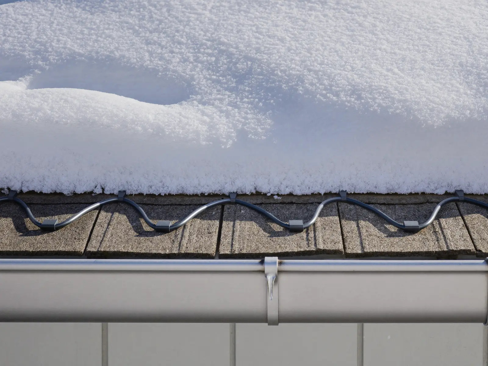 Heat trace cable protecting water pipes from freezing